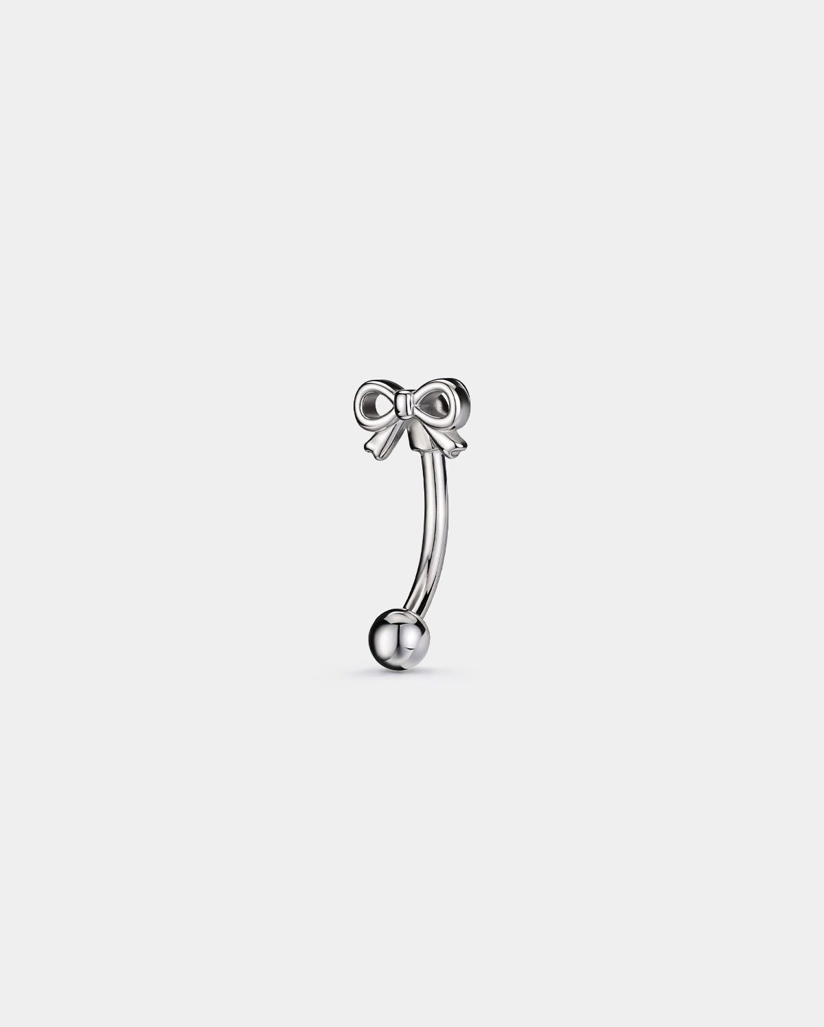 Bow eyebrow piercing