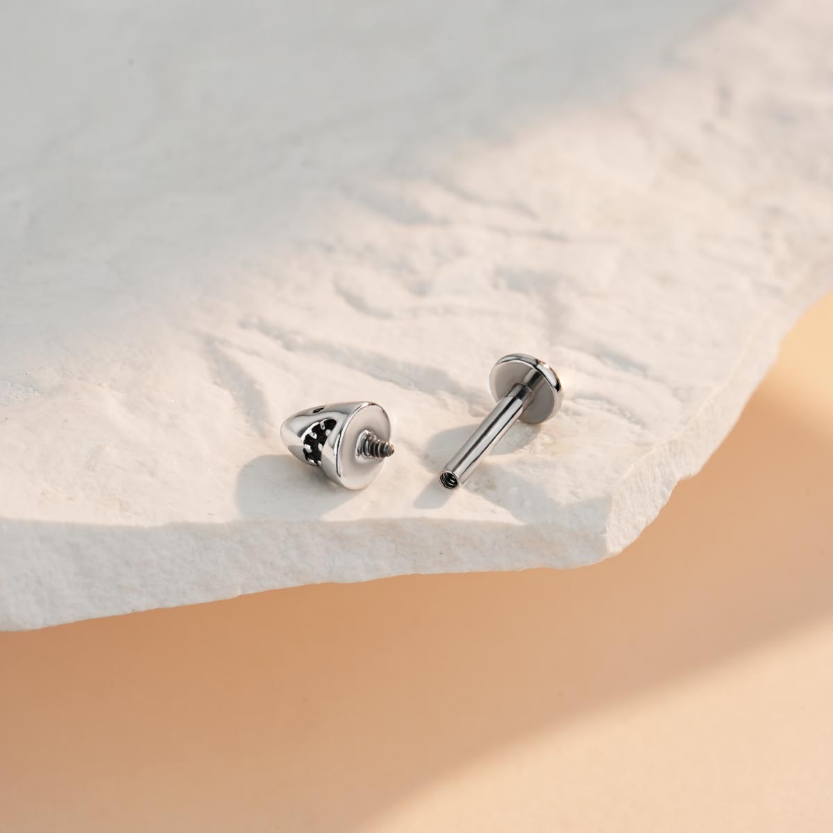 internally threaded shark head helix stud