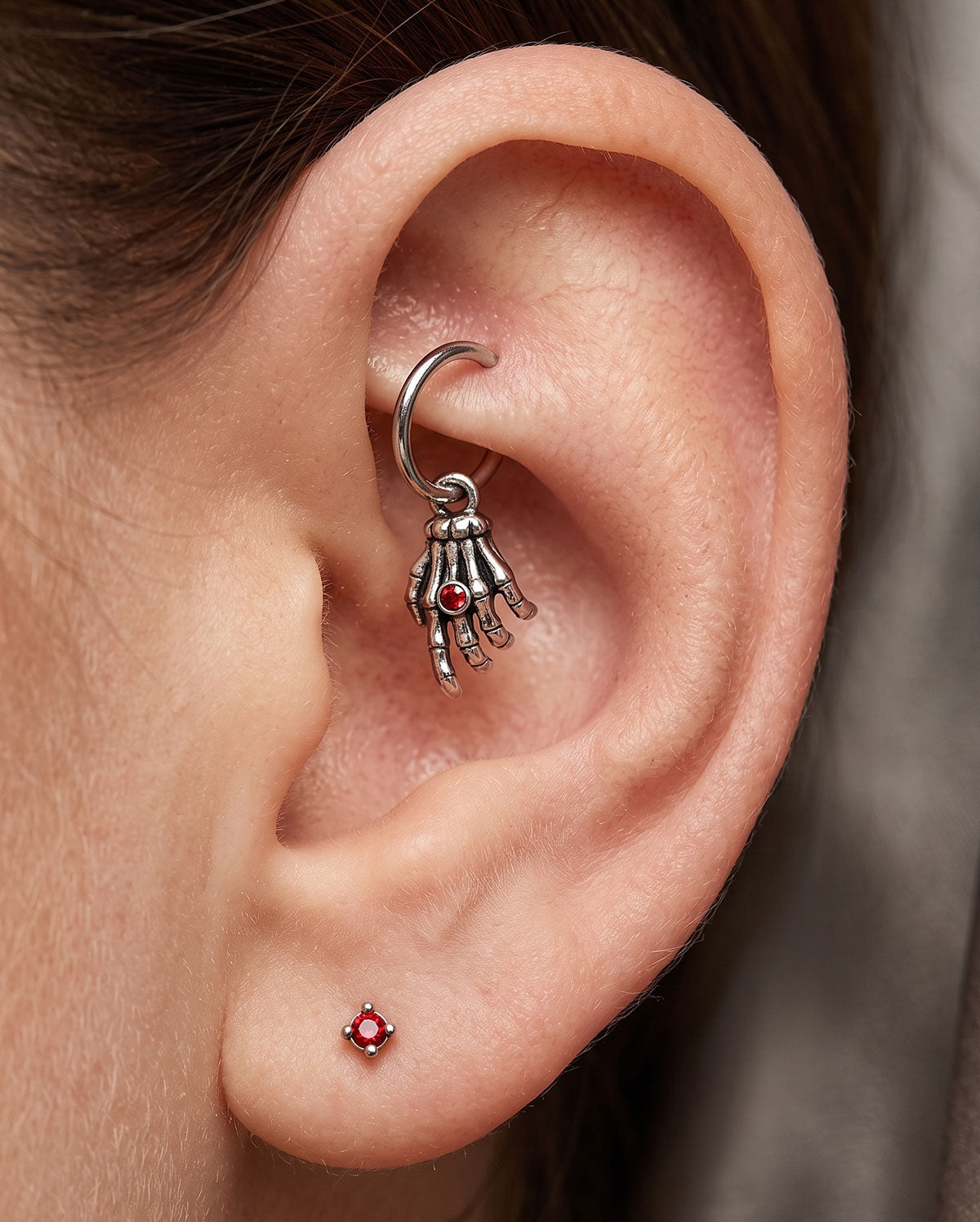 Skeleton Hand rook piercing