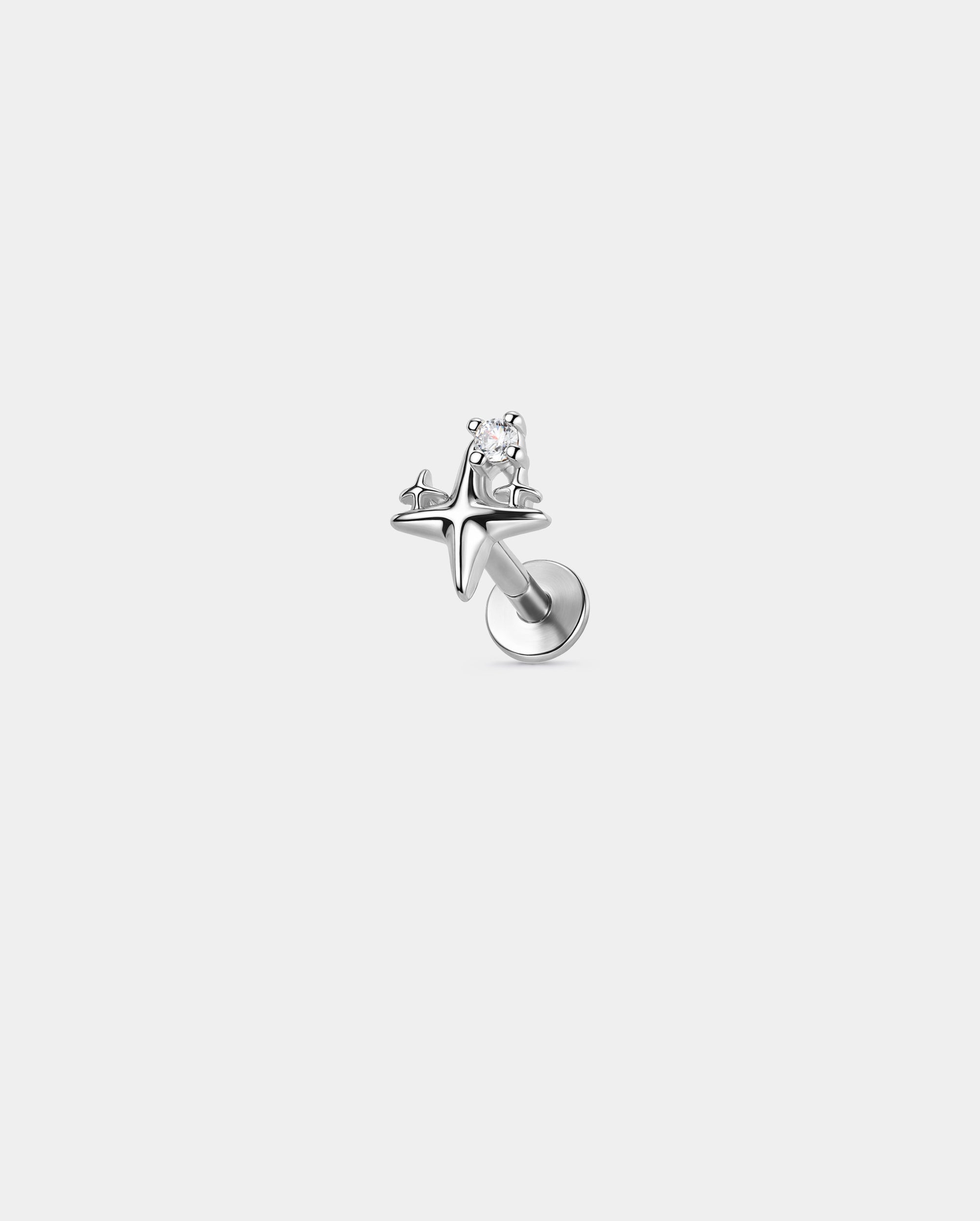 silver starburst cartilage earring