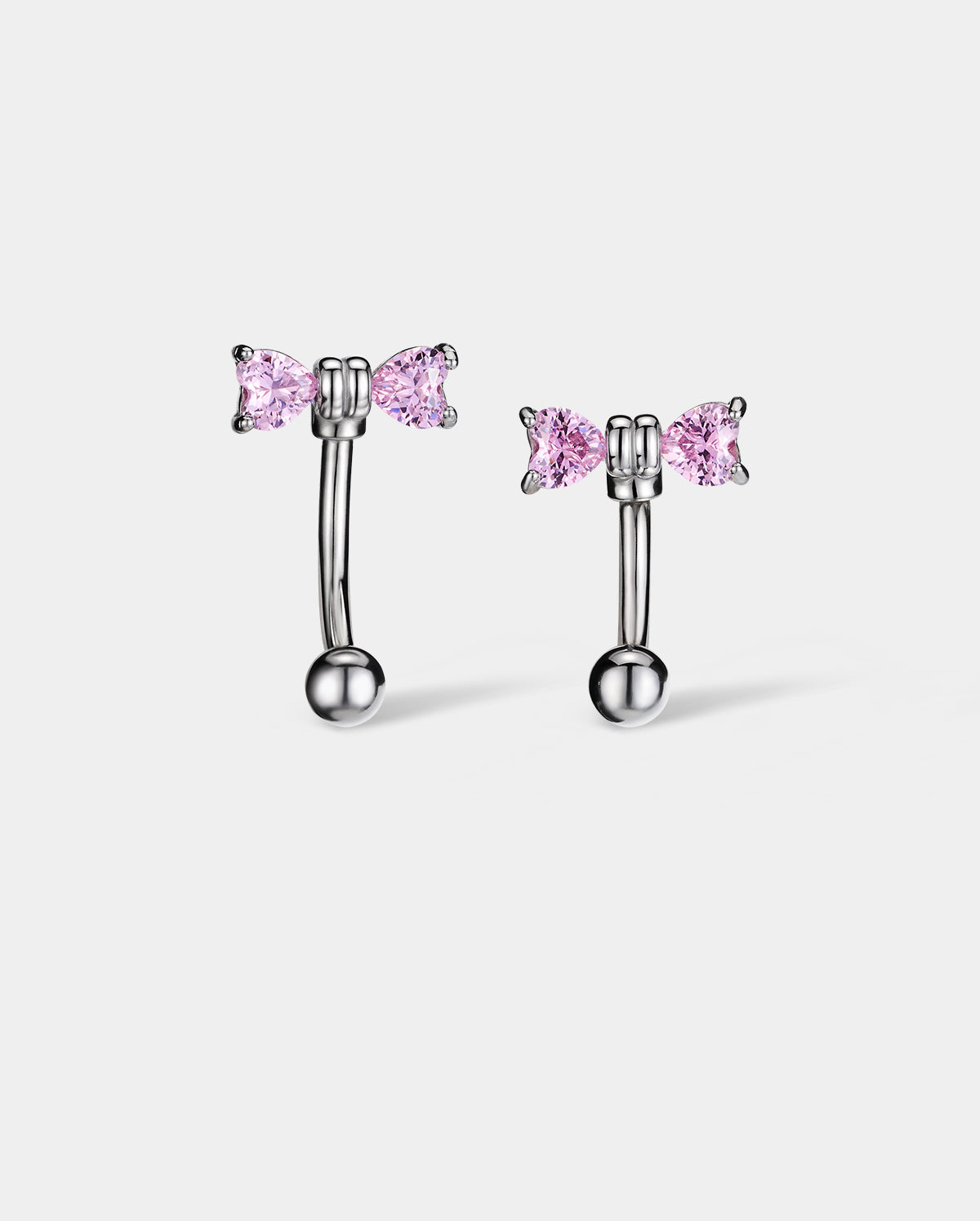 curved pink bow eyebrow piercing ring 