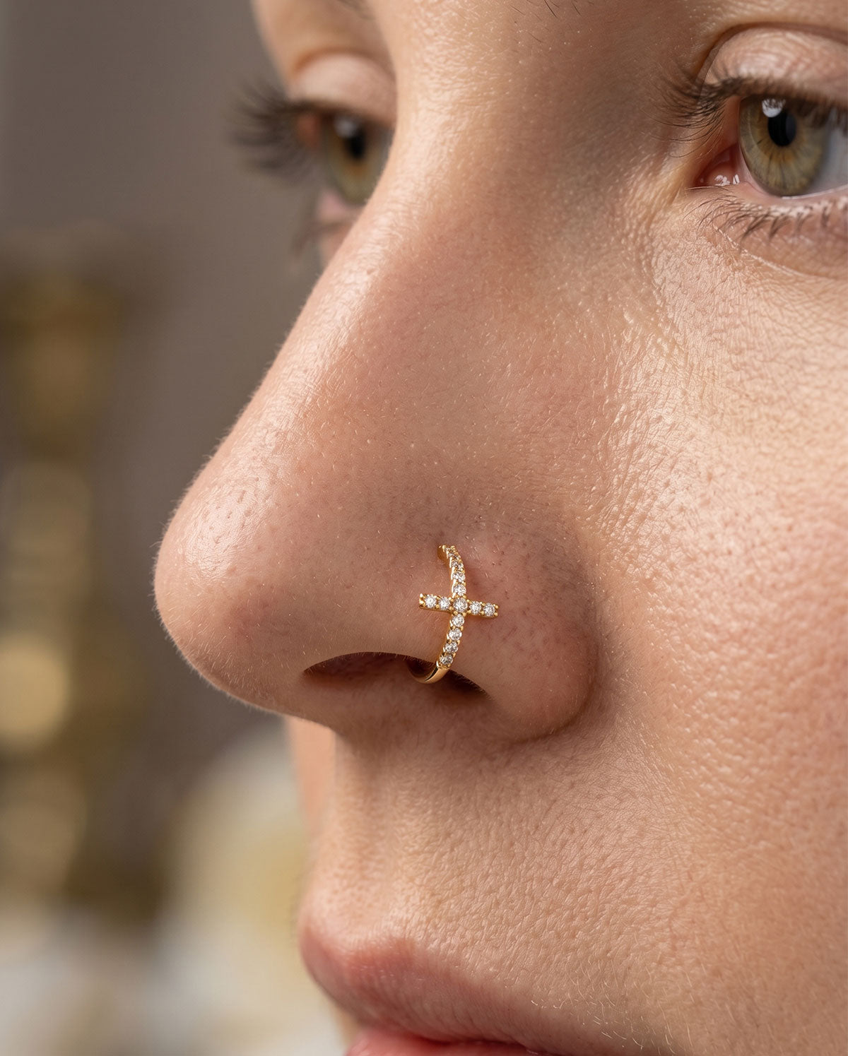 cross nose piercing