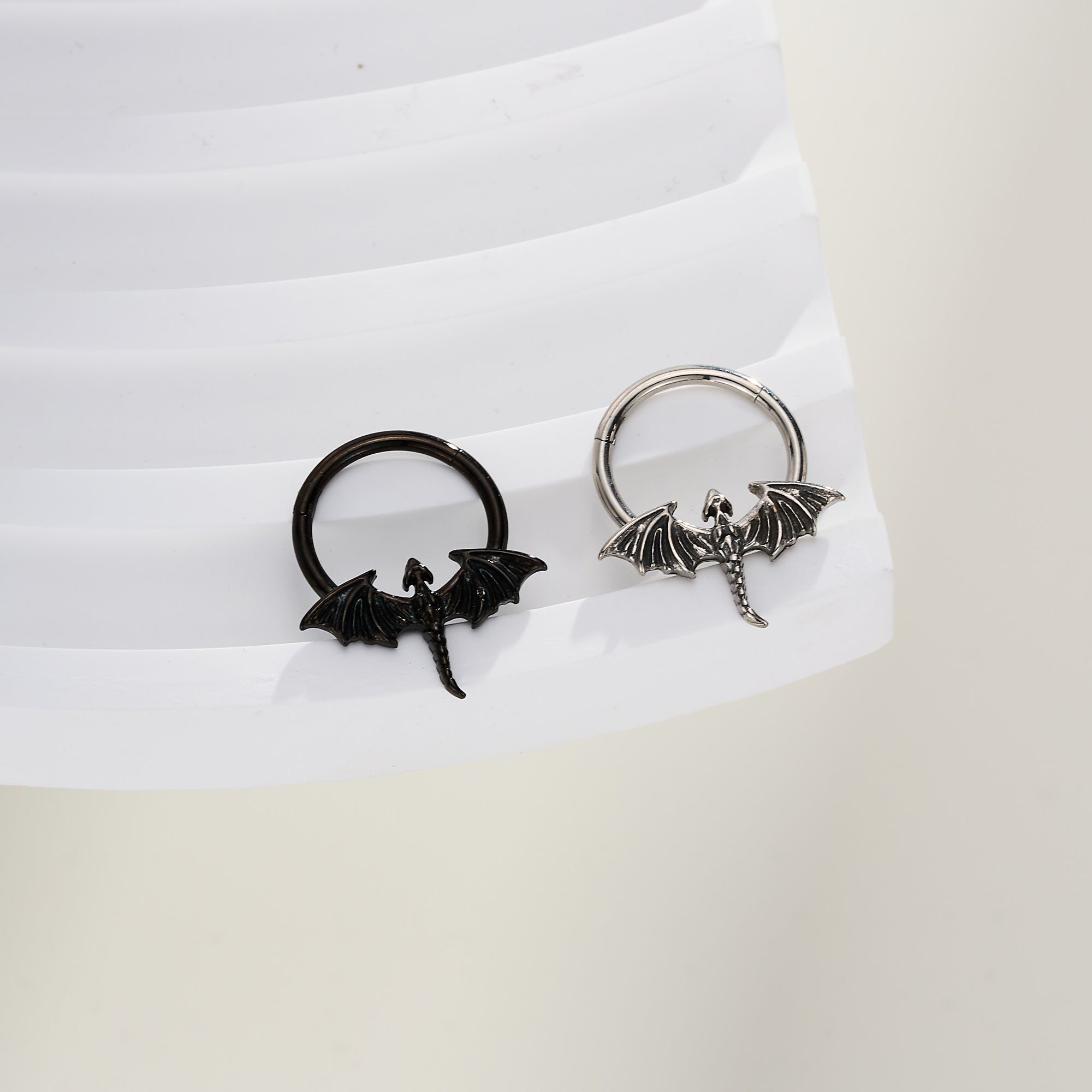 hinged silver and black Pterodactyl septum ring 